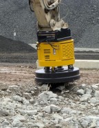 Atlas Copco Hydro Magnet HM 2000 F collecting steel on a jobsite